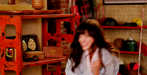 Zooey-Deschanel-Victory-In-a-Bath-Robe-On-New-Girl-Gif.gif