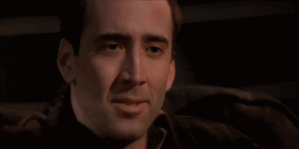 2564005-nicolas-cage-laughing.gif