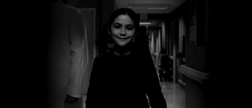 The-Orphan-Girl-Smiles-To-Serious-In-Horror-Gif.gif